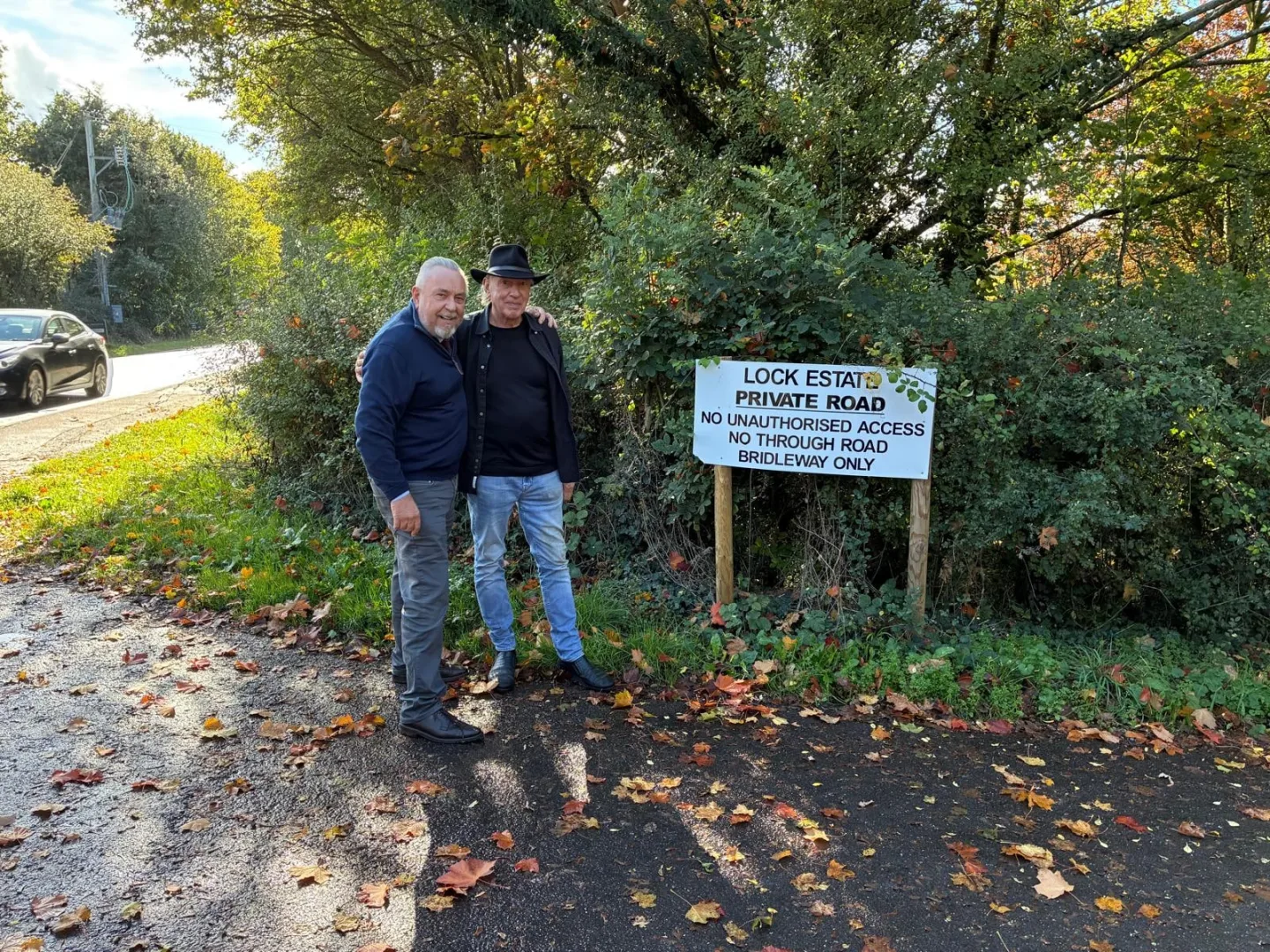 Robert Butcher Senior and Tony Robinson at the Lock Estate private road sign